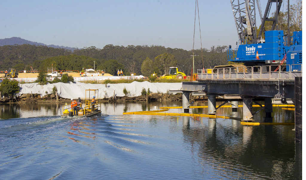 CROSSING: The temporary bridge across the Kalang River nearing completion. CROSSING: The temporary bridge across the Kalang River nearing completion.